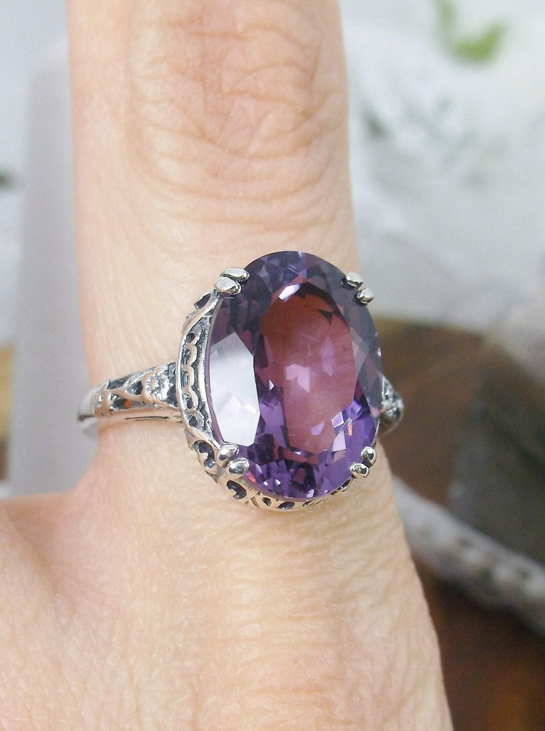 slightly off top view of Natural Purple Amethyst Sterling Silver Filigree Ring, Edward Design#70 on a finger
