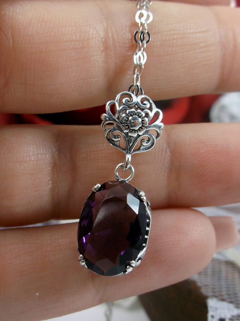 Purple Amethyst Pendant necklace, purple pendant, with a purple oval stone set in floral sterling silver filigree, 4 prongs hold the gem in place, Silver Embrace Jewelry