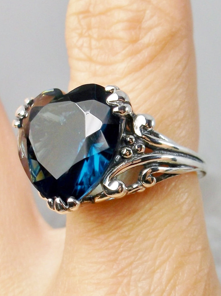 London Blue Topaz ring with a heart shaped gem and gothic style sterling silver filigree