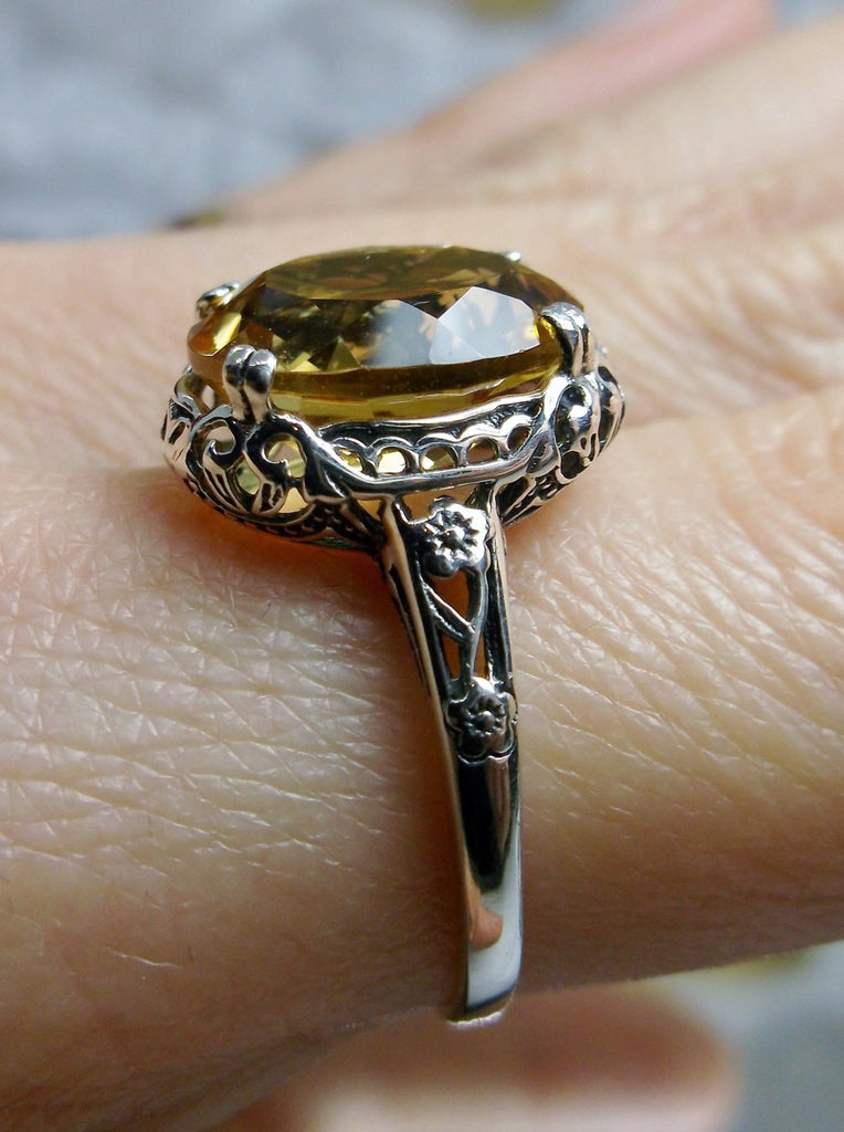 Natural Citrine Ring, Oval yellow citrine gemstone, sterling silver floral filigree, Edward Design #D70z, side view on a finger