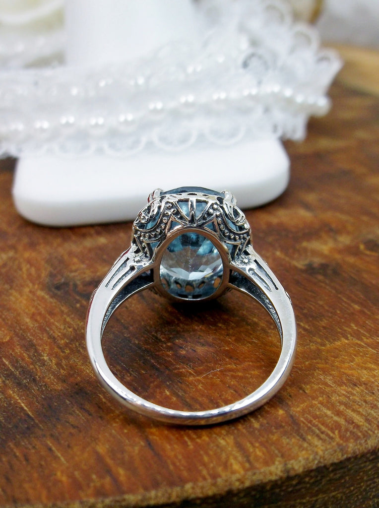 Natural Sky Blue Topaz Ring, 4.5 carat oval faceted stone, sterling Silver floral filigree, Edward design #D70z, back view of filigree and stone