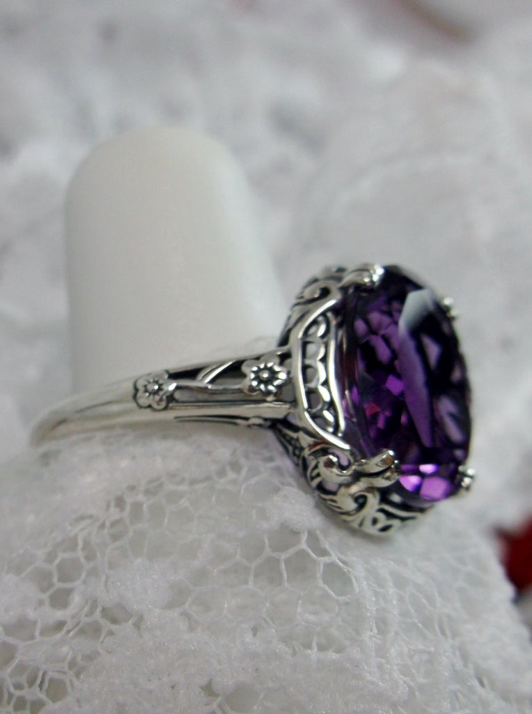 Natural Amethyst Ring, 3.3ct Natural oval Amethyst, Sterling Silver floral Filigree, Edward design #D70z,  offset side & front view on hand form and lace