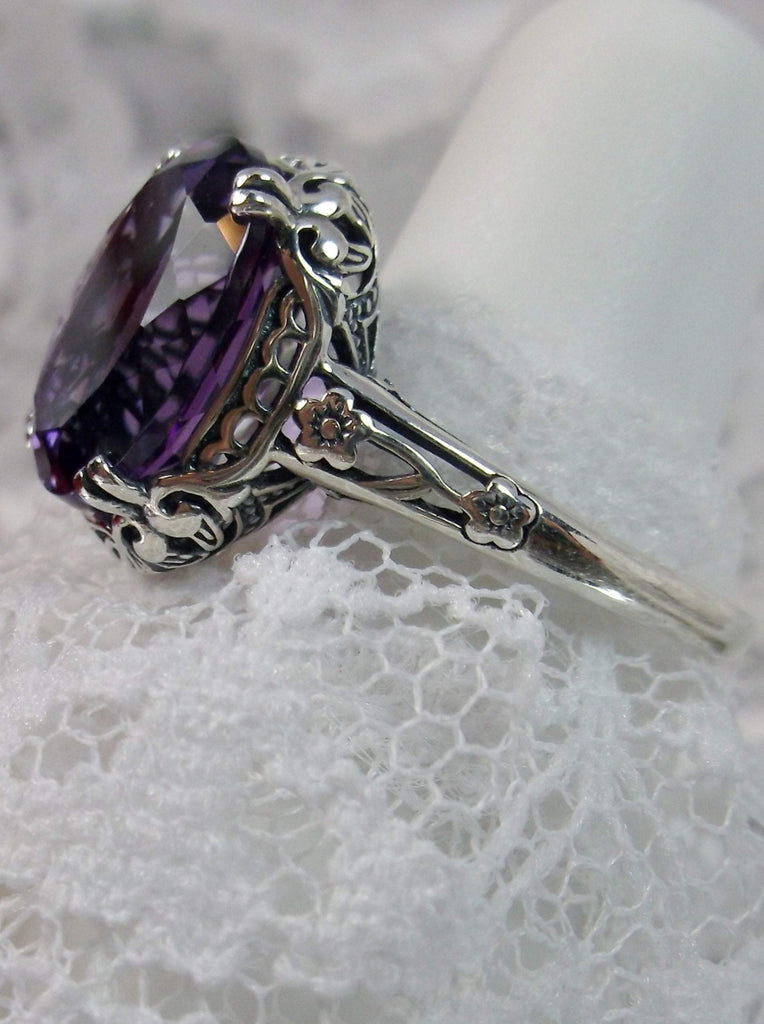 Natural Amethyst Ring, 3.3ct Natural oval Amethyst, Sterling Silver floral Filigree, Edward design #D70z, side view on lace and hand form