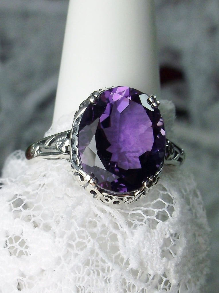Natural Amethyst Ring, 3.3ct Natural oval Amethyst, Sterling Silver floral Filigree, Edward design #D70z, front offset view on hand form and lace