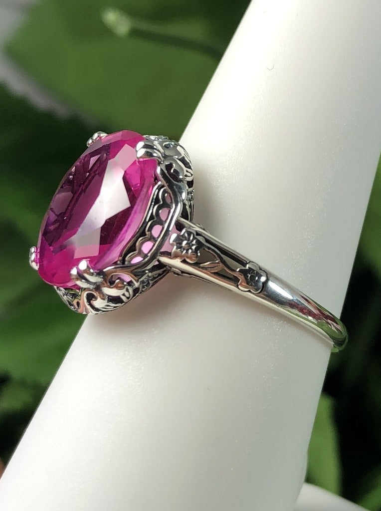 Natural Pink topaz Ring, 3.4 carat oval faceted gemstone, sterling silver floral filigree, Edward design #D70z, side view on ring form