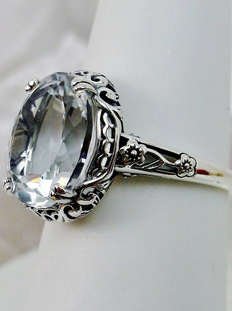Natural White Topaz Ring, 5 carat oval faceted gemstone,  Sterling Silver Floral Filigree, Edward design #D70z, offset side view