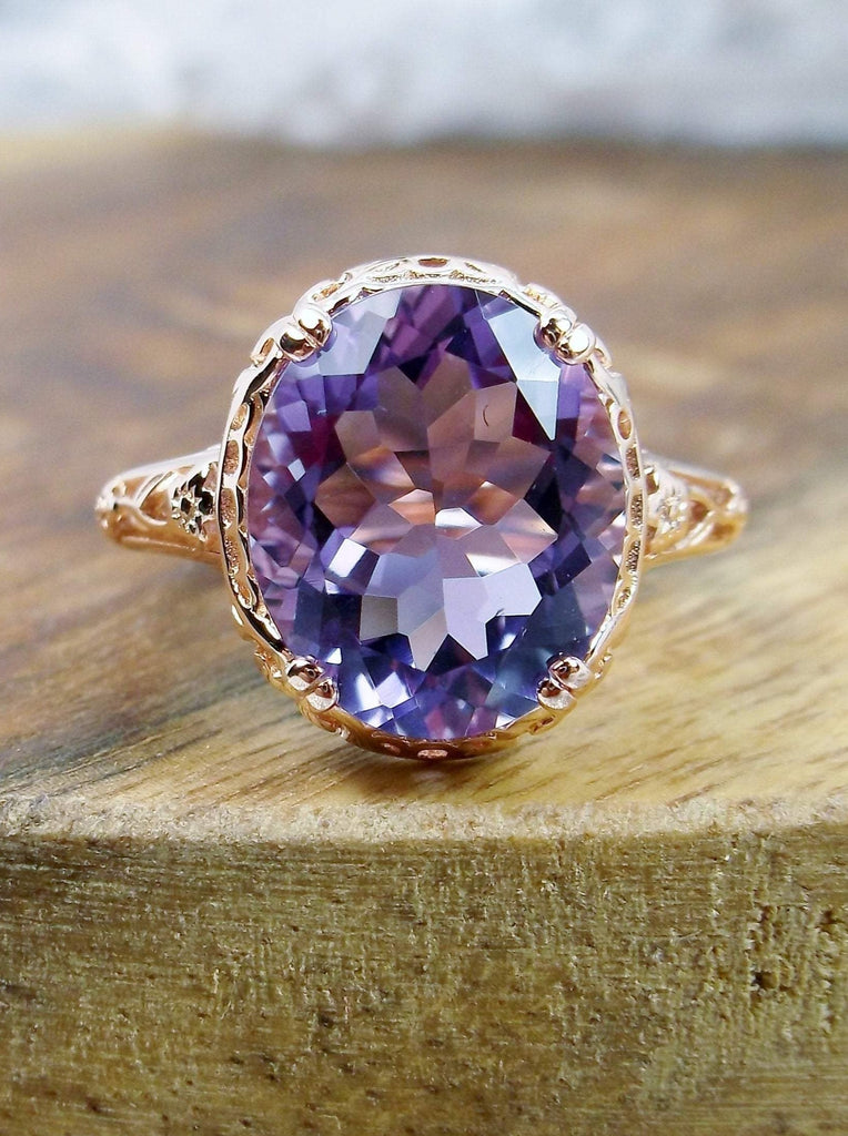Natural Amethyst Ring, 3.3ct Natural oval Amethyst, Rose Gold over Sterling Silver floral Filigree, Edward design #D70z, top view on wooden surface