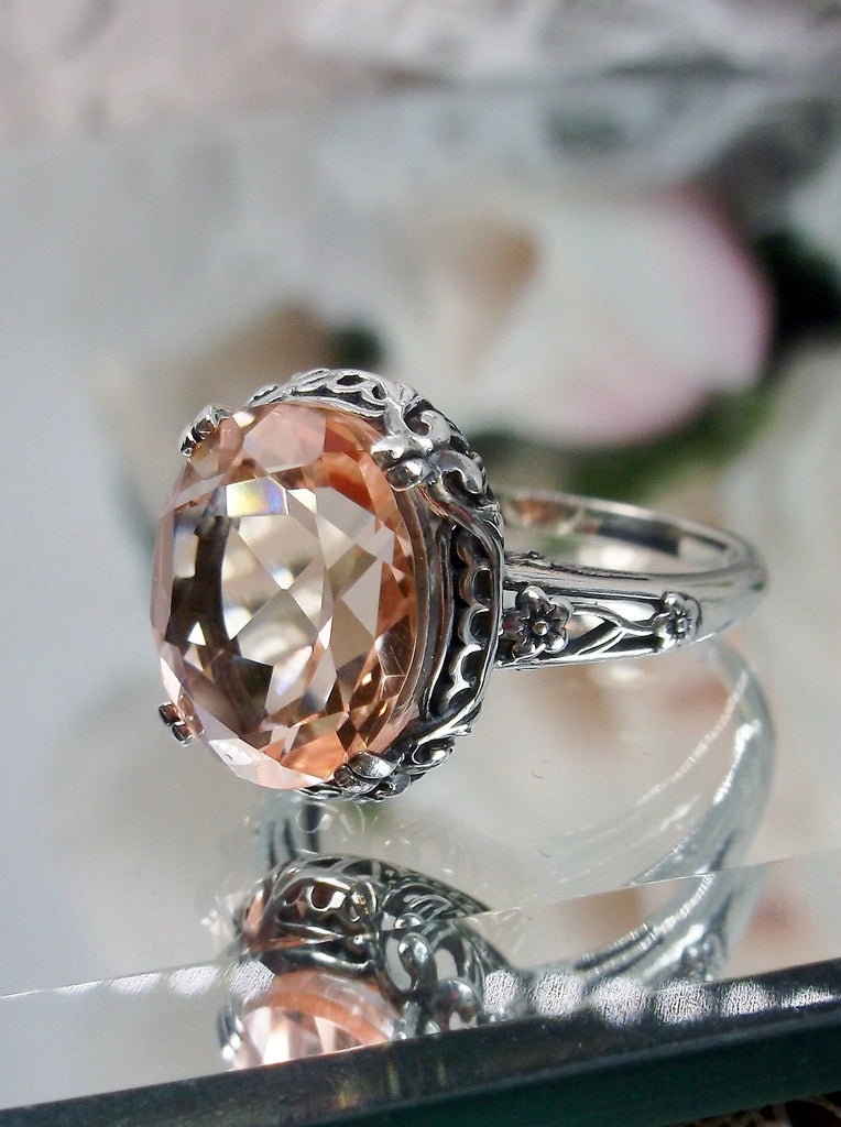 Peach Topaz Ring, 4 carat simulated topaz, Sterling Silver floral Filigree, Edward design #D70z, offset side view on mirror surface