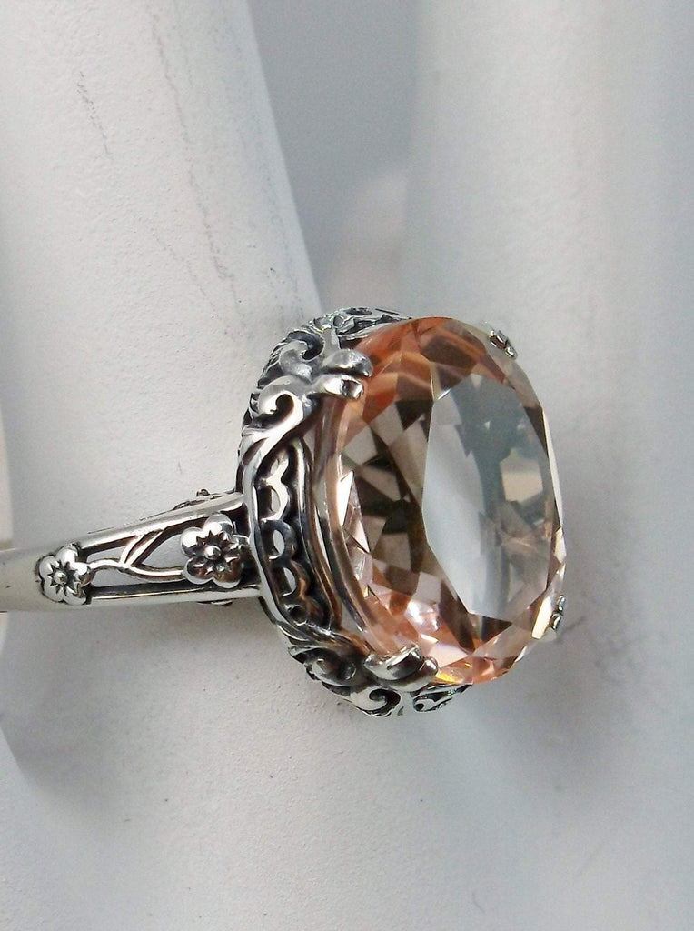 Peach Topaz Ring, 4 carat simulated topaz, Sterling Silver floral Filigree, Edward design #D70z, side view on hand form