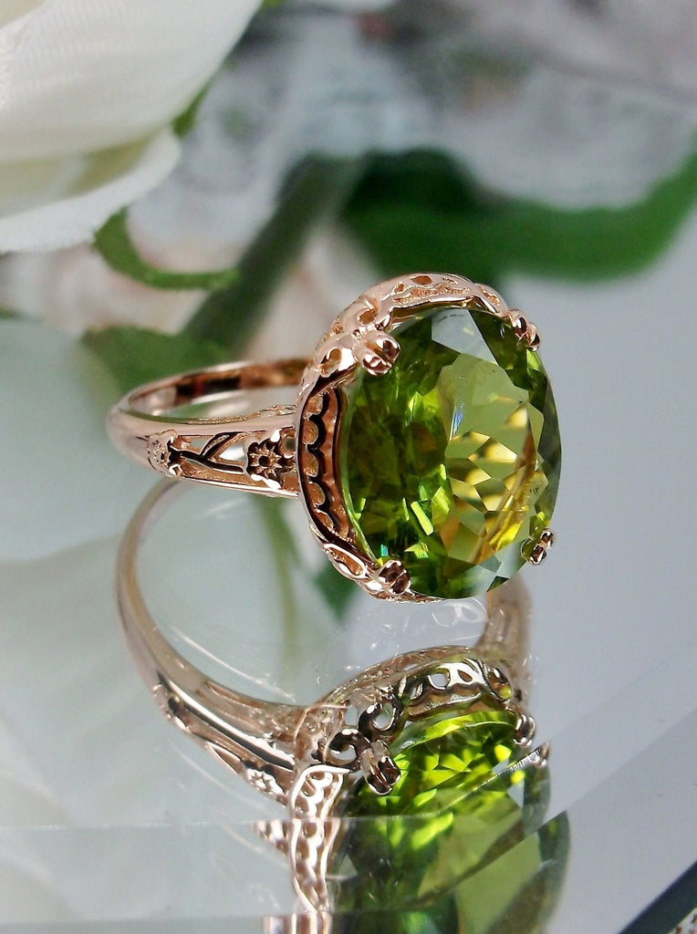 Natural Peridot Ring, 4 carat natural Green Peridot oval gemstone, Rose Gold over Sterling Silver floral Filigree, Edward design #D70z,, offset view on mirror surface