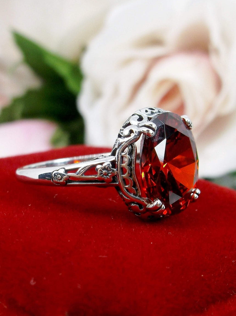 Red Garnet CZ Ring, Sterling Silver floral filigree, Edward Design #D70z,  side view on red velvet