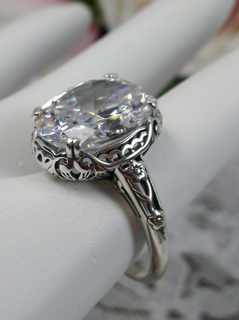 White CZ Ring, cubic zirconia gemstone, Sterling Silver floral Filigree, Edward design #D70z, offset side and top view on hand form