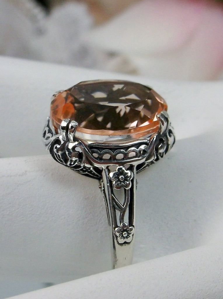 Peach Topaz Ring, 4 carat simulated topaz, Sterling Silver floral Filigree, Edward design #D70z, offset side view on hand form