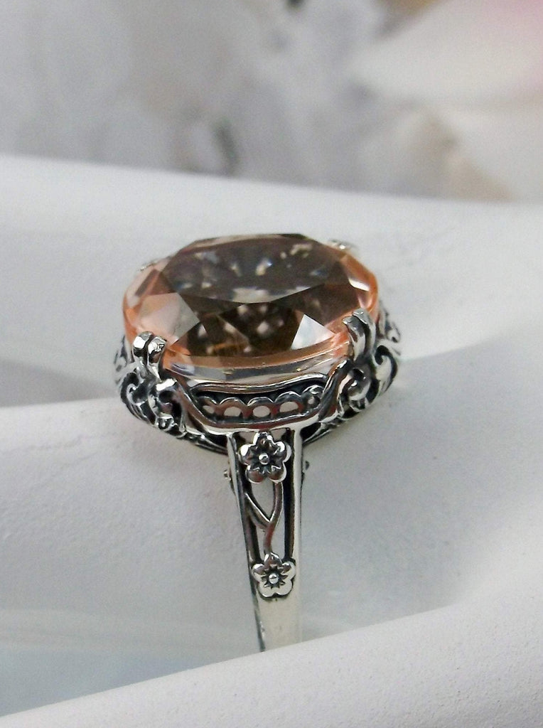 Peach Topaz Ring, 4 carat simulated topaz, Sterling Silver floral Filigree, Edward design #D70z, side view on hand form