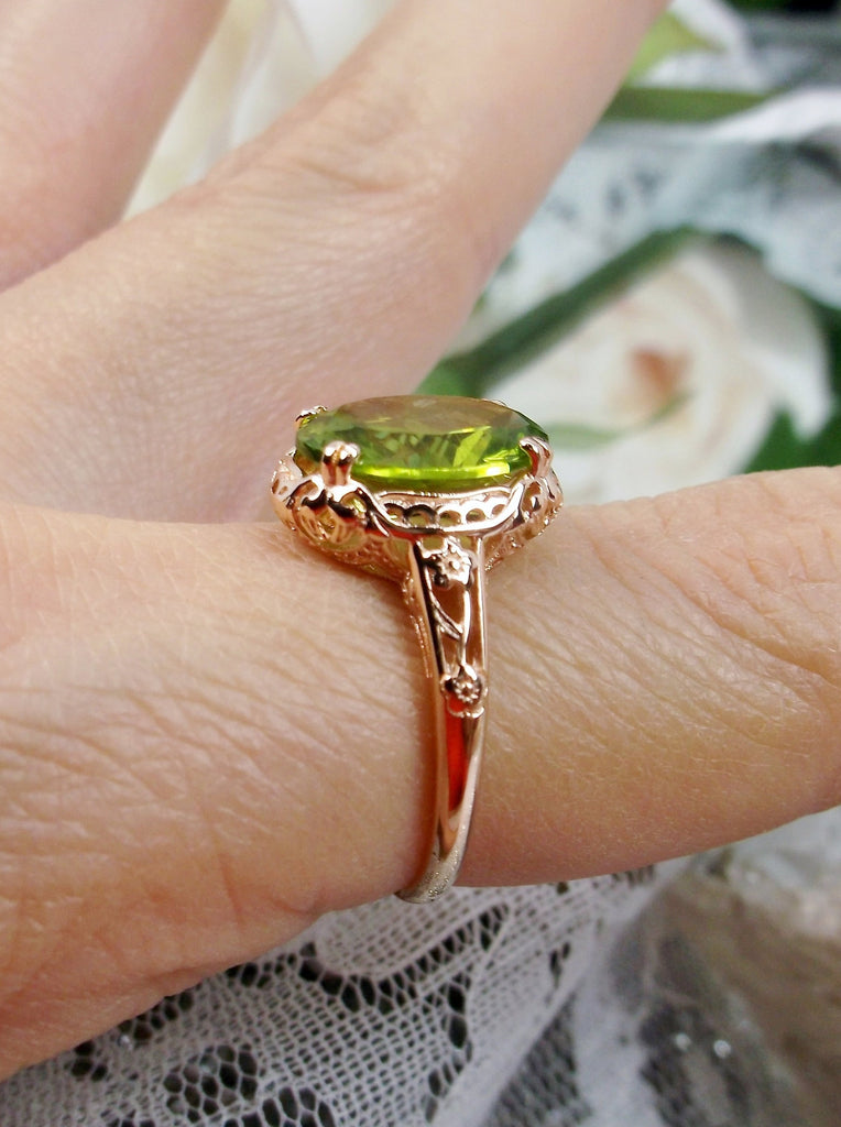 Natural Peridot Ring, 4 carat natural Green Peridot oval gemstone, Rose Gold over Sterling Silver floral Filigree, Edward design #D70z, side view on finger